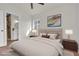 Serene bedroom with neutral tones, ensuite bathroom, and natural light at 2837 Reynolds Ave, North Las Vegas, NV 89030