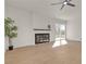 Bright living room with new floors, fireplace and a sliding glass door at 2837 Reynolds Ave, North Las Vegas, NV 89030