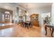 Open dining room with stylish chandelier, neutral paint, and easy access to the living area for seamless entertaining at 3040 Ocean Port Dr, Las Vegas, NV 89117