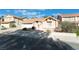 Attractive single-story home with a well-maintained front yard and a two-car garage at 3040 Ocean Port Dr, Las Vegas, NV 89117