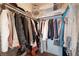Organized walk-in closet offering ample storage space with multiple hanging rods and shelves at 3040 Ocean Port Dr, Las Vegas, NV 89117
