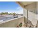Cozy balcony space with seating and a view of the surrounding neighborhood at 3924 Quiet Pine St # 201, Las Vegas, NV 89108