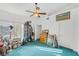 Bright bedroom with a ceiling fan, carpet, and a collection of personal items at 3924 Quiet Pine St # 201, Las Vegas, NV 89108