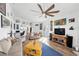 Comfortable living room with hardwood floors, ceiling fan, and plenty of seating at 3924 Quiet Pine St # 201, Las Vegas, NV 89108