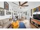 Inviting living room with hardwood floors, a ceiling fan, and comfortable furniture arrangement at 3924 Quiet Pine St # 201, Las Vegas, NV 89108