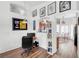 Functional office space with a desk, bookcase, and adjacent dining area at 3924 Quiet Pine St # 201, Las Vegas, NV 89108
