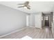 Spacious bedroom with light woodgrain flooring and walk-in closet at 457 Cornelius Kelly Ave, Henderson, NV 89011