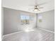 Bright, airy bedroom with two windows providing ample natural light at 457 Cornelius Kelly Ave, Henderson, NV 89011