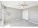 Bedroom featuring a ceiling fan, bright windows, and closet at 457 Cornelius Kelly Ave, Henderson, NV 89011