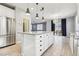 Kitchen island provides ample storage and countertop space, open to the dining and living areas at 457 Cornelius Kelly Ave, Henderson, NV 89011