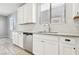 The kitchen boasts sleek, stainless steel appliances and a bright, window-side sink at 457 Cornelius Kelly Ave, Henderson, NV 89011