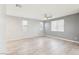 Expansive living space boasting recessed lights, ceiling fan, and generously sized windows for abundant natural light at 457 Cornelius Kelly Ave, Henderson, NV 89011