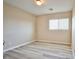 Bedroom features wood-style flooring and a bright window at 4817 Eureka Diamond Ct, Las Vegas, NV 89139