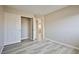 Bedroom features closet, wood-style flooring, and natural light at 4817 Eureka Diamond Ct, Las Vegas, NV 89139