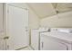 Functional laundry room is equipped with a washer, dryer, and additional storage, perfect for busy households at 4817 Eureka Diamond Ct, Las Vegas, NV 89139
