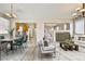 Spacious living and dining area features stylish decor and an open floor plan to the kitchen and entryway at 4817 Eureka Diamond Ct, Las Vegas, NV 89139