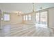 The living room provides ample space with access to sliding glass door and an abundance of natural light at 4817 Eureka Diamond Ct, Las Vegas, NV 89139