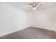 Spacious bedroom with neutral carpet and ceiling fan at 539 Sellers Pl, Henderson, NV 89011