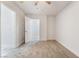 Neutral bedroom boasts neutral carpet and fresh, white paint with a door leading to a walk-in closet at 539 Sellers Pl, Henderson, NV 89011