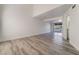 Bright and airy living room featuring modern flooring and a sliding glass door at 539 Sellers Pl, Henderson, NV 89011