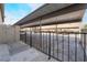 Apartment parking showing covered spaces with black metal barriers in front at 539 Sellers Pl, Henderson, NV 89011