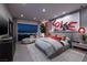 Serene main bedroom featuring a large bed, modern decor, city views, and a comfortable lounge area at 545 Overlook Rim Dr, Henderson, NV 89012