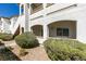 Exterior view of a condo building with landscaped surroundings at 5655 E Sahara Ave # 1060, Las Vegas, NV 89142
