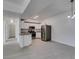 Bright kitchen is highlighted by eat-in bar, modern appliances, and updated cabinets at 5655 E Sahara Ave # 1060, Las Vegas, NV 89142