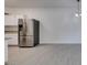 The kitchen features stainless steel appliances, and the room has light wood flooring at 5655 E Sahara Ave # 1060, Las Vegas, NV 89142