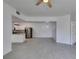 Bright living room connected to the kitchen featuring stainless steel refrigerator at 5655 E Sahara Ave # 1060, Las Vegas, NV 89142
