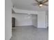 Spacious living room with ceiling fan, wood-look flooring, and abundant natural light at 5655 E Sahara Ave # 1060, Las Vegas, NV 89142