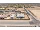 An aerial view highlighting the modern property, its landscaping, and surrounding neighborhood at 5719 Christian Creek Ct, Las Vegas, NV 89149