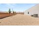 Spacious backyard featuring a gravel landscape, mountain views and block wall at 5719 Christian Creek Ct, Las Vegas, NV 89149