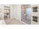Elegant bathroom with a glass-enclosed shower with marble surround, and a view into the bedroom at 5719 Christian Creek Ct, Las Vegas, NV 89149