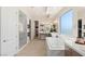 Luxurious bathroom with soaking tub, double vanity, and glass shower at 5719 Christian Creek Ct, Las Vegas, NV 89149