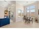Sunlit dining area adjacent to a sliding glass door with backyard views at 5719 Christian Creek Ct, Las Vegas, NV 89149