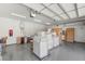 Spacious garage with storage, epoxy floors and overhead lighting at 5719 Christian Creek Ct, Las Vegas, NV 89149