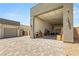 Garage featuring an extra tall door, work area, and plenty of storage space at 5719 Christian Creek Ct, Las Vegas, NV 89149