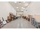 Spacious garage featuring stairs to loft and ample space for storage at 5719 Christian Creek Ct, Las Vegas, NV 89149