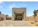 Extra tall garage door and driveway with pavers perfect for RV parking at 5719 Christian Creek Ct, Las Vegas, NV 89149