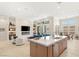 Bright, open kitchen and living area with abundant natural light at 5719 Christian Creek Ct, Las Vegas, NV 89149