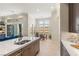 Stylish kitchen featuring quartz countertops and stainless steel hardware at 5719 Christian Creek Ct, Las Vegas, NV 89149