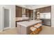 Bright kitchen with a large island, stainless steel appliances, and modern cabinetry at 5719 Christian Creek Ct, Las Vegas, NV 89149