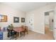 Office space with a desk and chairs, built in shelves, and access to other rooms at 5719 Christian Creek Ct, Las Vegas, NV 89149