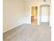 Neutral carpeted bedroom with a bathroom attached at 6160 Rumrill St # 207, Las Vegas, NV 89113