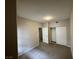 Carpeted bedroom with a closet and an open doorway at 6160 Rumrill St # 207, Las Vegas, NV 89113