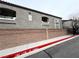 Exterior street view of the building showing unit numbers and Fire Lane signage at 6160 Rumrill St # 207, Las Vegas, NV 89113