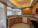 Kitchen features a breakfast bar, tile floor, and stainless steel appliances at 6160 Rumrill St # 207, Las Vegas, NV 89113