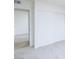 Bright bedroom featuring neutral carpet and sliding-door closet at 6170 W University Ave, Las Vegas, NV 89103