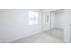 Bright bedroom with neutral carpet, window, and closet with mirrored doors at 6170 W University Ave, Las Vegas, NV 89103